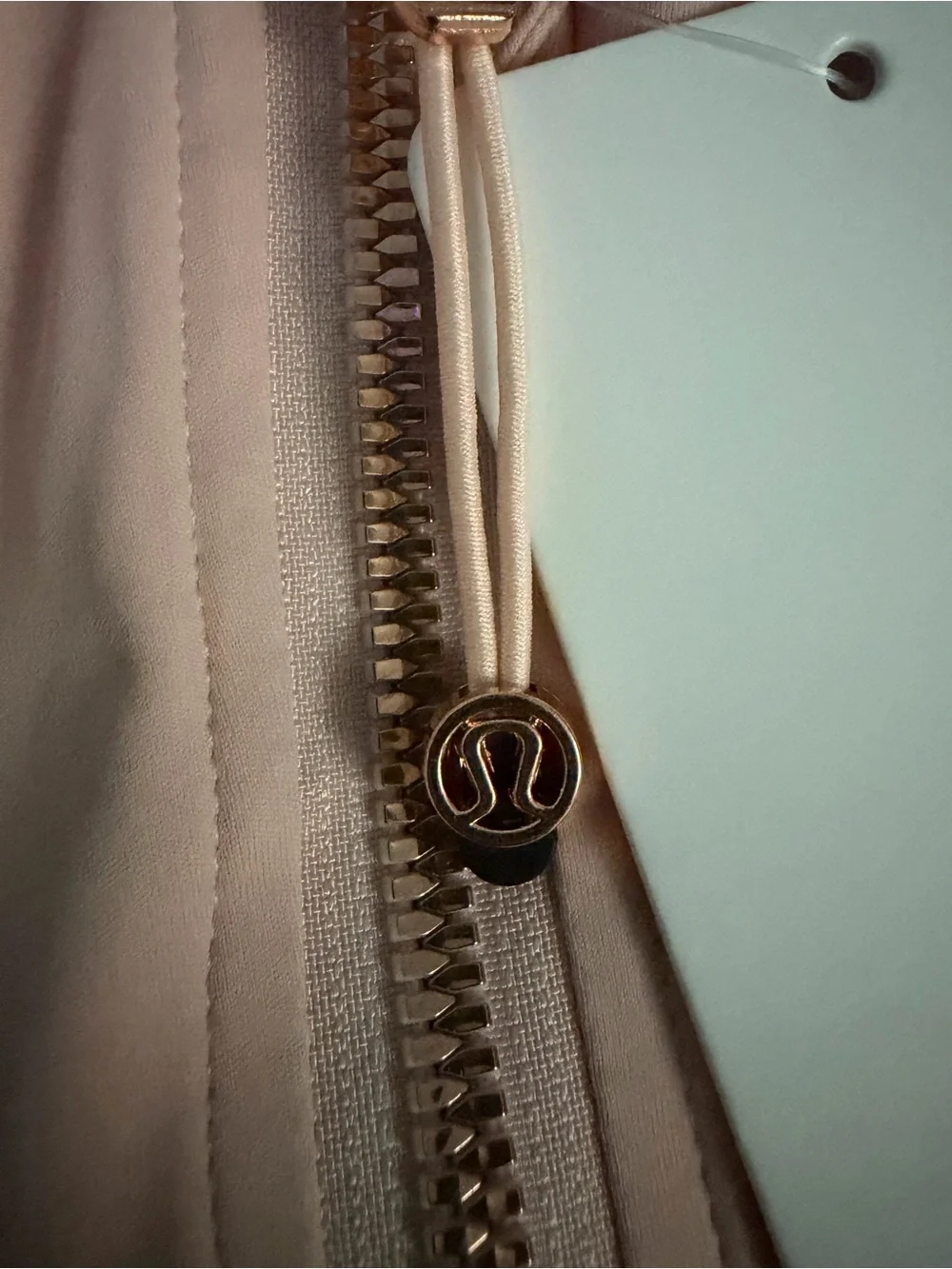 Pink Lululemon Define Jacket with Gold zipper and gold pocket zipper